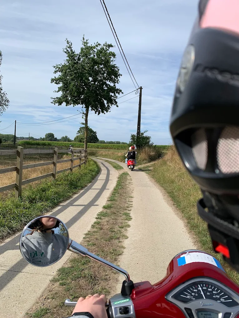 Vespa on a quiet country lane in the Hageland